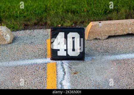 forty yard line marker ready for a marching band rehearsal Stock Photo