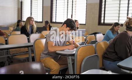 Young people studying inside university classroom - School education concept Stock Photo