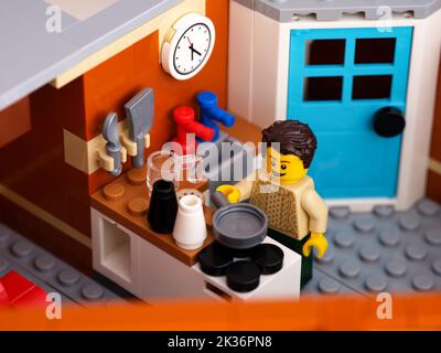 Tambov, Russian Federation - January 04, 2022 A Lego Man minifigure in his small kitchen Stock Photo