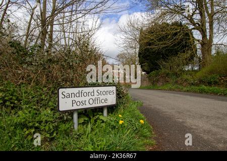 SANDFORD, DEVON, UK - APRIL 6, 2022 Sandford Village sign Stock Photo