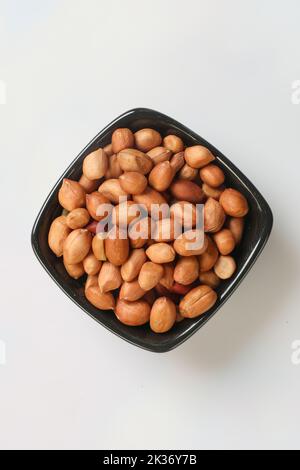 Big peanut set isolated on white background. Groundnuts shelled and in nutshell. Package design. Stock Photo