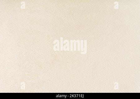 Texture of natural fabric or cloth. Fabric texture diagonal weave of natural cotton or linen textile material. Beige canvas background. Decorative fab Stock Photo