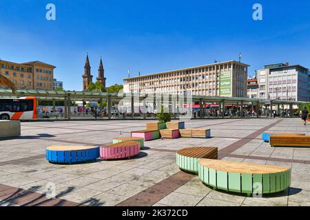 Ludwigshafen, Germany - August 2022: Town square called 'Berliner Platz' with public transportation bus and tram station Stock Photo