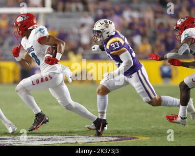 New Mexico Lobos wide receiver Geordon Porter (8) rush for some yardage while being chased by LSU Tigers linebacker West Weeks (33) during a college football game at Tiger Stadium in Baton Rouge, Louisiana on Saturday, September 24, 2022.  (Photo by Peter G. Forest/Sipa USA) Stock Photo