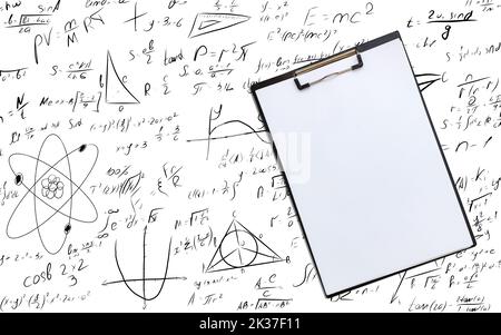 clip board on the background of formulas Stock Photo