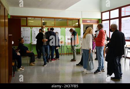 Rome, Italy. 25th Sep, 2022. Citizens prepare to cast their ballots at a polling station in Rome, Italy, Sept. 25, 2022. Polls opened to renew the parliament in Italy early on Sunday, in a snap election seen as crucial for the country. Credit: Jin Mamengni/Xinhua/Alamy Live News Stock Photo
