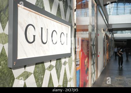 Singapore Marina bar 12 June 2022. Gucci sign on a marble wall. Stock Photo