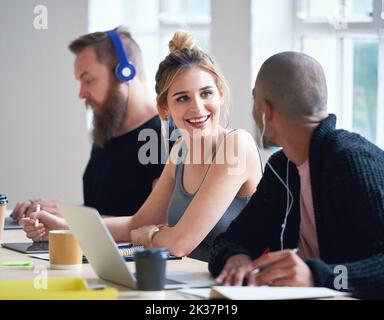 College students in class young woman discussing group project with friend brainstorming ideas together enjoying teamwork Stock Photo