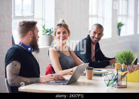 College students in class young woman discussing group project with friend brainstorming ideas together enjoying teamwork Stock Photo
