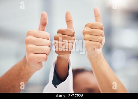 Yes, success or thank you thumbs up hand sign of workers happy about work goal or target completion. Winner, teamwork agreement or team win of Stock Photo