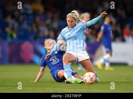 Chelsea's Erin Cuthbert (left) and Manchester City's Laura Coombs battle for the ball during the Barclays Women's Super League match at Kingsmeadow Stadium, London. Picture date: Sunday September 25, 2022. Stock Photo