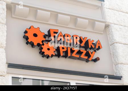 Krosno, Poland - June 12, 2022: Logo and sign of Fabryka Pizzy. Stock Photo