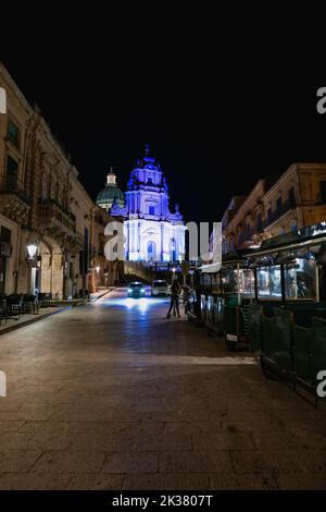 Taxi (and touristic train) at Ragusa Ibla Stock Photo