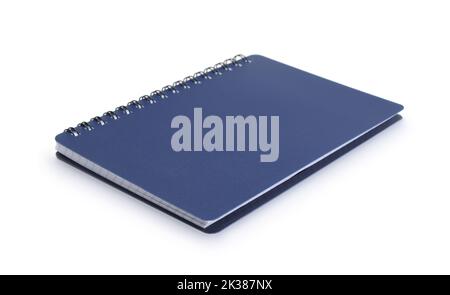 Blue closed notebook isolated on white. Side view. Stock Photo