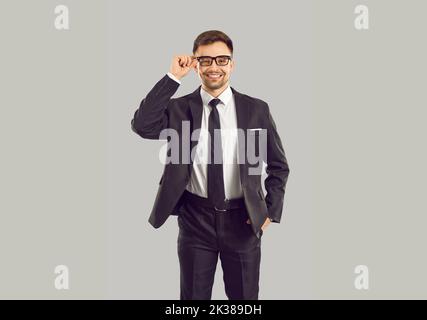 Confident young businessman in formalwear and glasses Stock Photo