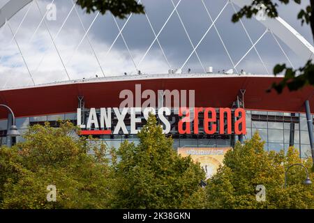 LanXess Arena arch high above Cologne skyline on a autumn day Stock Photo