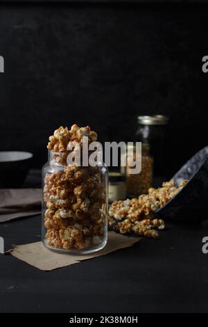 Homemade caramel popcorn in a glass jar Stock Photo