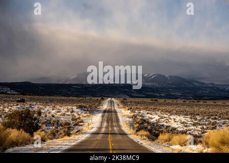 Snow Covered Utah 211 Heading To The Needles District In Winter in central Utah Stock Photo