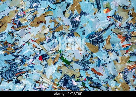 Remains of a biodegradable plastic bag after decomposition. Self-degrading plastic. Ecology concept. Background. Stock Photo