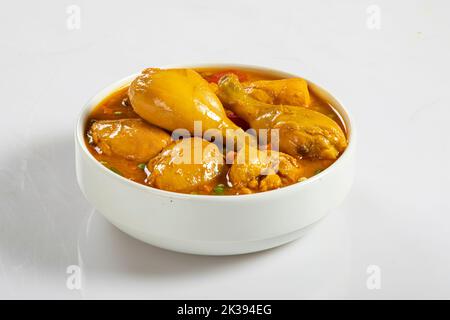 Chicken curry in white bowl on white background Stock Photo