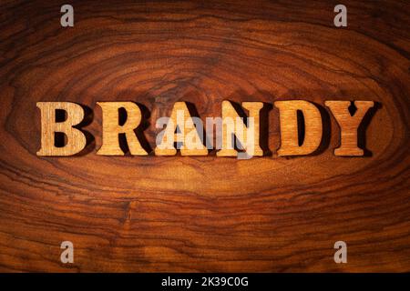 Brandy word - Inscription by wooden letters close up Stock Photo