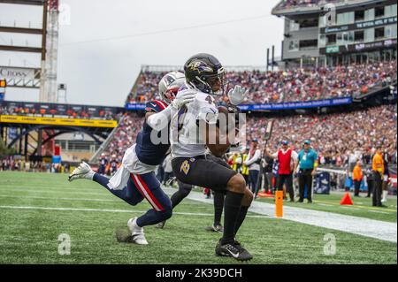 New England Patriots' DeVante Parker, right, against Baltimore Ravens'  Jalyn Armour-Davis, center, and Chuck Clark, left, during an NFL football  game, Sunday, Sept. 25, 2022, in Foxborough, Mass. (AP Photo/Paul  Connors).(AP Photo/Paul