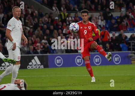 Cardiff, Wales, UK. 25th September, 2022. Welsh forward Brennan Johnson in action during the UEFA Nations league group A4 match  Wales v Poland at Cardiff City Stadium, Wales. Credit: Penallta Photographics/Alamy Live News Stock Photo