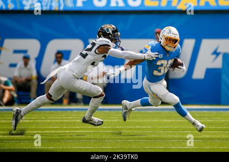 October 9, 2022 - Jacksonville, FL, U.S: Houston Texans wide receiver Nico  Collins (12) makes catches the ball while being defended by Jacksonville  Jaguars cornerback Tyson Campbell (32) during 2nd half NFL