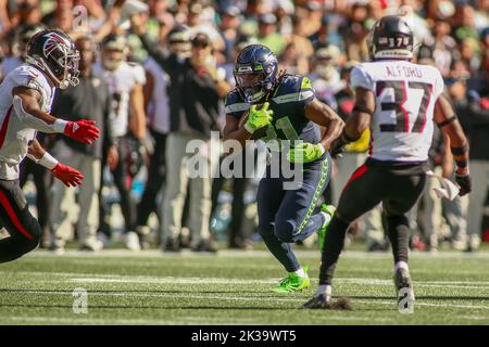 Seattle Seahawks running back DeeJay Dallas (31) runs with the ball during  an NFL football game against the Los Angeles Rams, Sunday, Dec. 4, 2022, in  Inglewood, Calif. (AP Photo/Kyusung Gong Stock