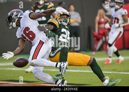 Green Bay Packers' Keisean Nixon trto get past Chicago Bears' Josh Blackwell  during the first half of an NFL football game Sunday, Dec. 4, 2022, in  Chicago. (AP Photo/Charles Rex Arbogast Stock