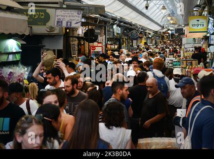 Crowded and colorful Machane Yehuda market in Jerusalem, Israel. Stock Photo