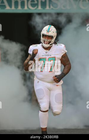 Sunday, September 25, 2022; Miami Gardens, FL USA;  Miami Dolphins defensive tackle John Jenkins (77) enters the field from the tunnel at the start an Stock Photo
