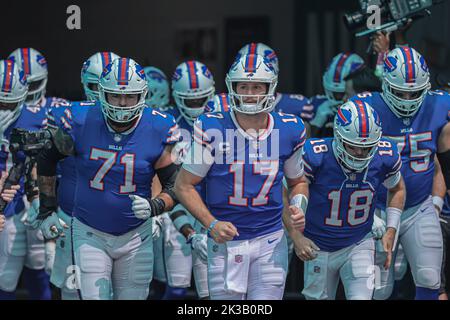 Buffalo Bills quarterback Josh Allen wears a Buffalo Sabres jersey