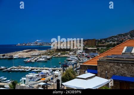 A beautiful shot of the Byblos Dock And Fishing Port on a sunny day in the city of Byblos, Lebanon Stock Photo