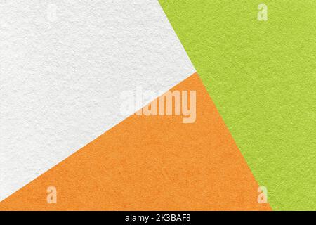 Texture of craft white, green and orange shade color paper background, macro. Structure of vintage abstract cardboard with geometric shape and gradien Stock Photo