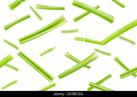 Falling celery isolated on white background, selective focus Stock Photo