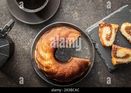 Flat lay of homemade bundt cake, spiral bundt cake, Top view of coconut bundt  cake Stock Photo - Alamy