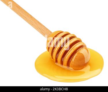 Honey dripping isolated on white background, clipping path, full depth of field Stock Photo