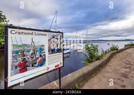 Site of the discovery of the 'Cramond Lioness' Roman sculpture. Historical information sign by the River Almond at Cramond, Edinburgh, Scotland, UK Stock Photo