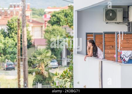 Leptokarya, Greece - June 10, 2018: A view of the guests of a private hotel in the small quiet town of Leptokaria, Greece. Stock Photo