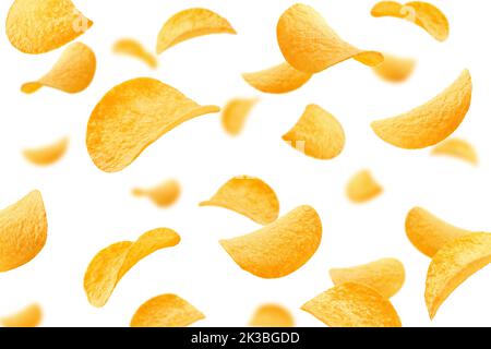 Falling potato chips isolated on a white background, selective focus Stock Photo
