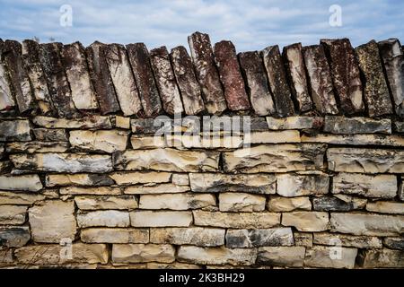 Dry stone walling that encloses some of the vineyards in the Beaune area, Burgundy, France. Stock Photo