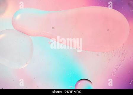 Defocused pastel colored abstract background picture made with oil, water and soap Stock Photo