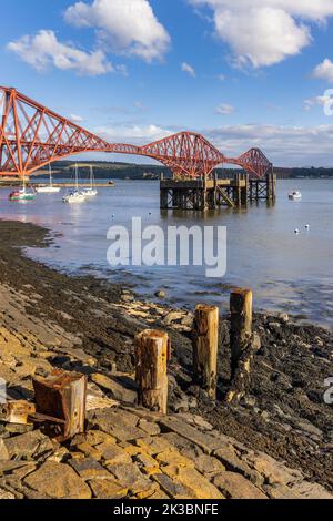 The Forth rail bridge spreading across the Firth of Forth connecting north and south Queensferry. Taken from North Queensferry. Stock Photo