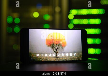 AI Midjourney logo on the phone screen on the background of the server room. Smartphone with artificial intelligence neural network logo - Moscow, Rus Stock Photo