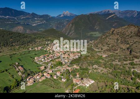 Aerial view of the town of Sant Julià de Cerdanyola and the Alt Berguedà region. In the background, the Pedraforca massif (Berguedà, Catalonia, Spain) Stock Photo