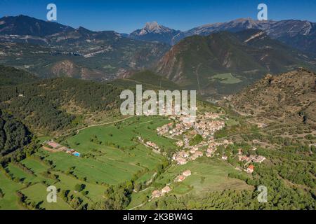 Aerial view of the town of Sant Julià de Cerdanyola and the Alt Berguedà region. In the background, the Pedraforca massif (Berguedà, Catalonia, Spain) Stock Photo