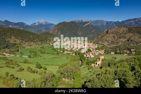 Aerial view of the town of Sant Julià de Cerdanyola and the Alt Berguedà region. In the background, the Pedraforca massif (Berguedà, Catalonia, Spain) Stock Photo