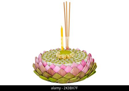 Pink lotus petal krathong that have 3 incense sticks and candle decorates with lotus pollen and crown flower for Thailand full moon or Loy Krathong fe Stock Photo