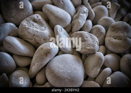 White pebble stones on the beach of Myrtos Stock Photo